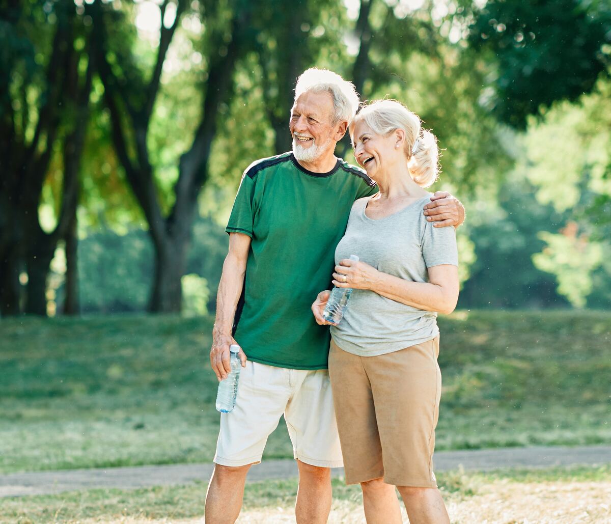 Gray-divorce counseling for older adults — an active senior couple in a sunny Los Angeles park, late-life relationship-change therapy.