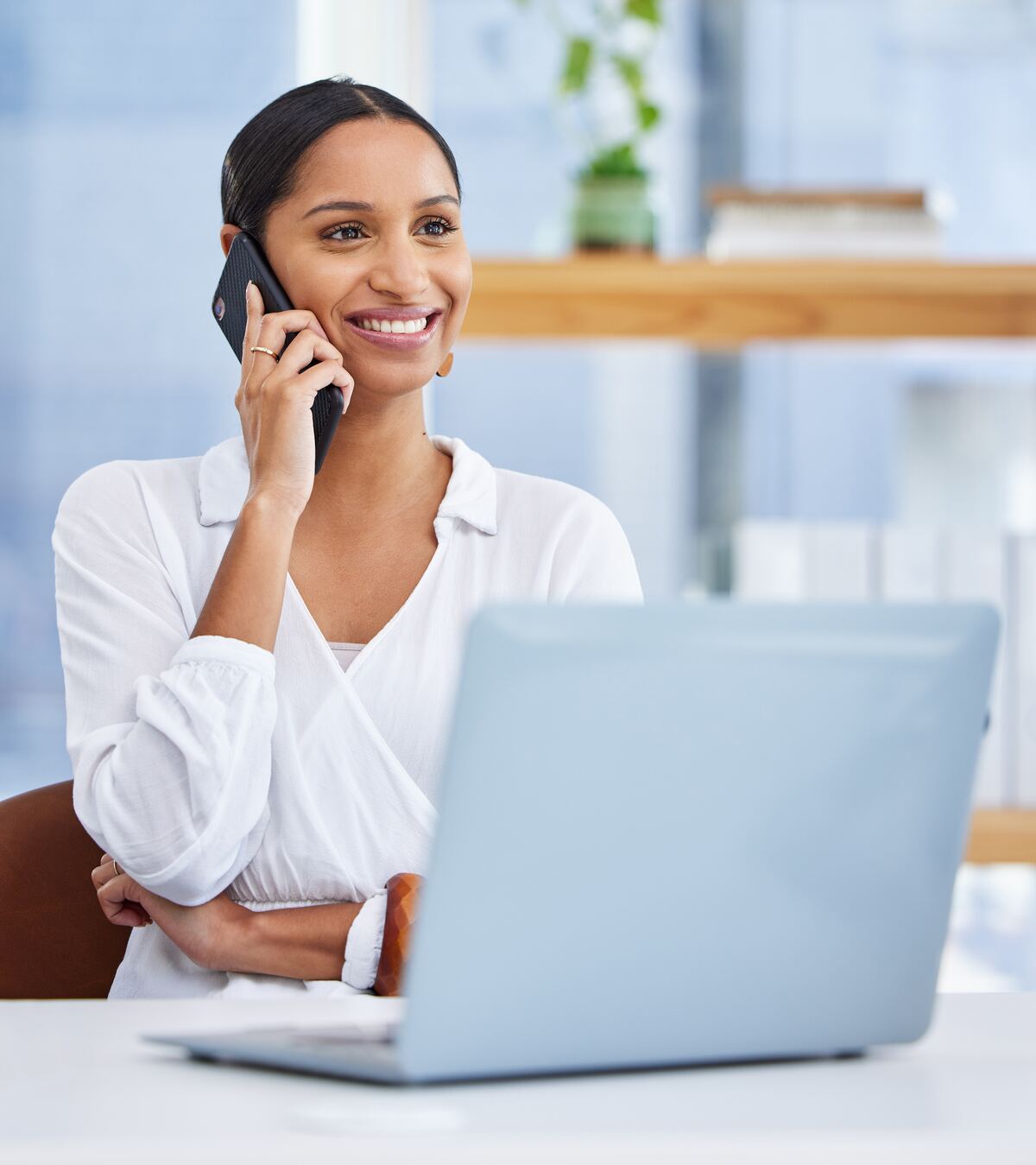 An older adult sitting in calm afternoon light — a real person answers when you call Pasadena Clinical Group.